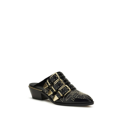 Mules Flat Shoes by Chloé for women in bos taurus calf leather black showcases a enchanting silhouette as part of the Icon Women's Bos Taurus Calf Leather Mules Flat Shoes collection, defined by a enchanting and for a enchanting look.