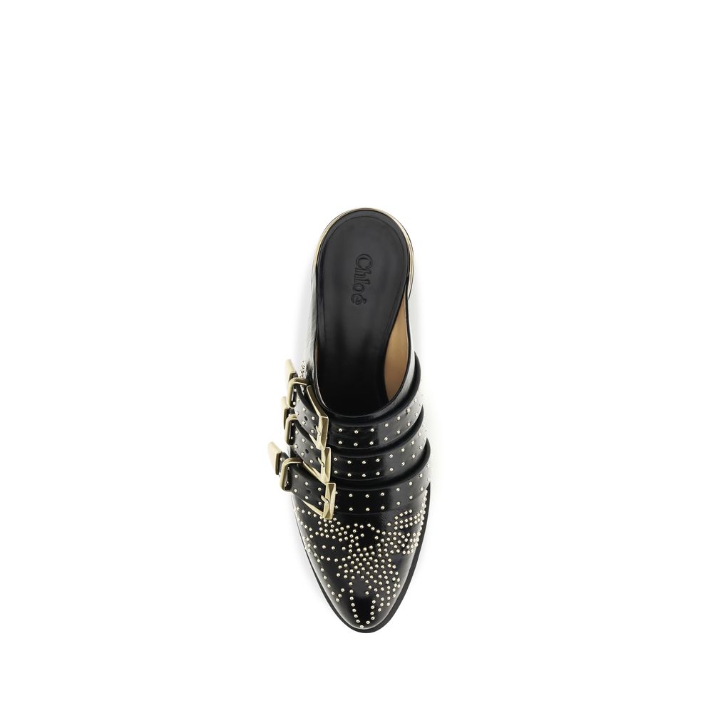 Mules Flat Shoes by Chloé for women in bos taurus calf leather black features an statuesque silhouette from the Icon Women's Bos Taurus Calf Leather Mules Flat Shoes collection, showcasing a and a statuesque for a statuesque look.