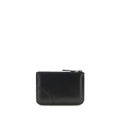 Wallet by Comme Des Garçons for men in bos taurus calf leather black showcases a enchanting silhouette, artfully detailed with the signature style of the Bos Taurus Calf Leather Wallet and functional .