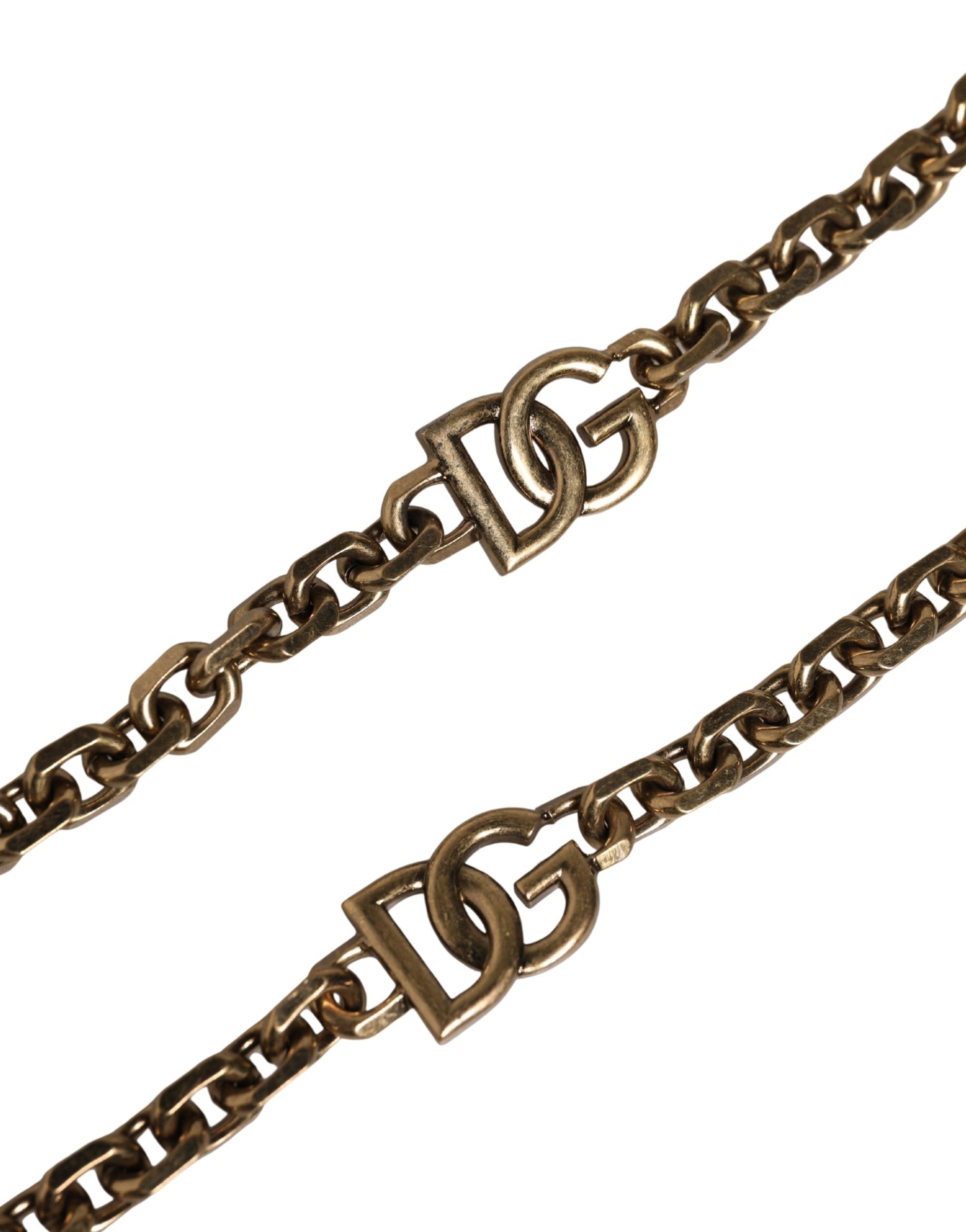 Shoulder Strap by Dolce & Gabbana for women in brass zamak & calf leather black, gold, pearl & white showcases a enviable design, perfect for elevating any ensemble as part of the Brass Zamak Calf Leather Shoulder Strap collection.