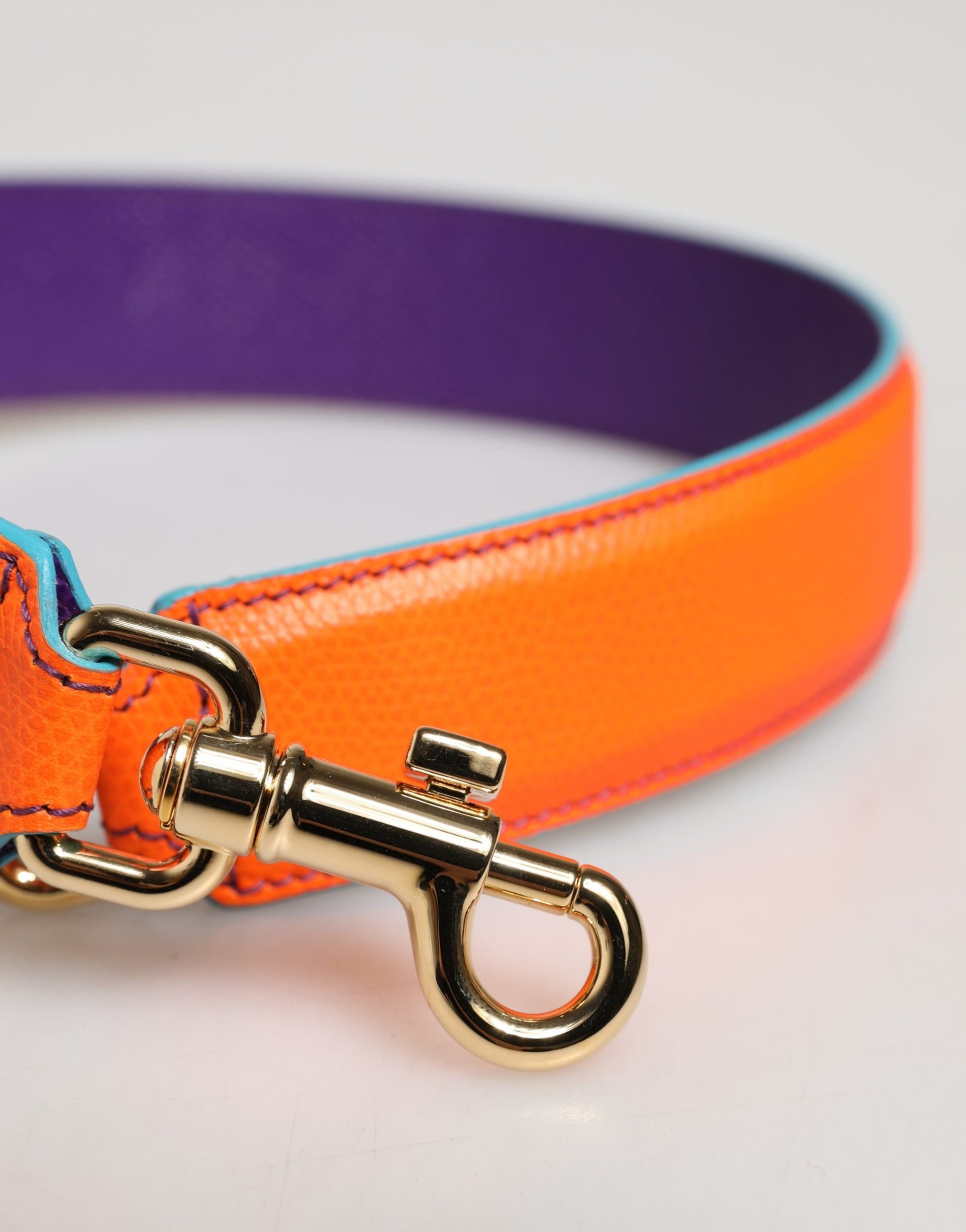 Shoulder Strap by Dolce & Gabbana for women in calf leather gold, orange & purple features a contemporary design, highlighting the distinctive style of the Calf Leather Shoulder Strap with a contemporary finish.