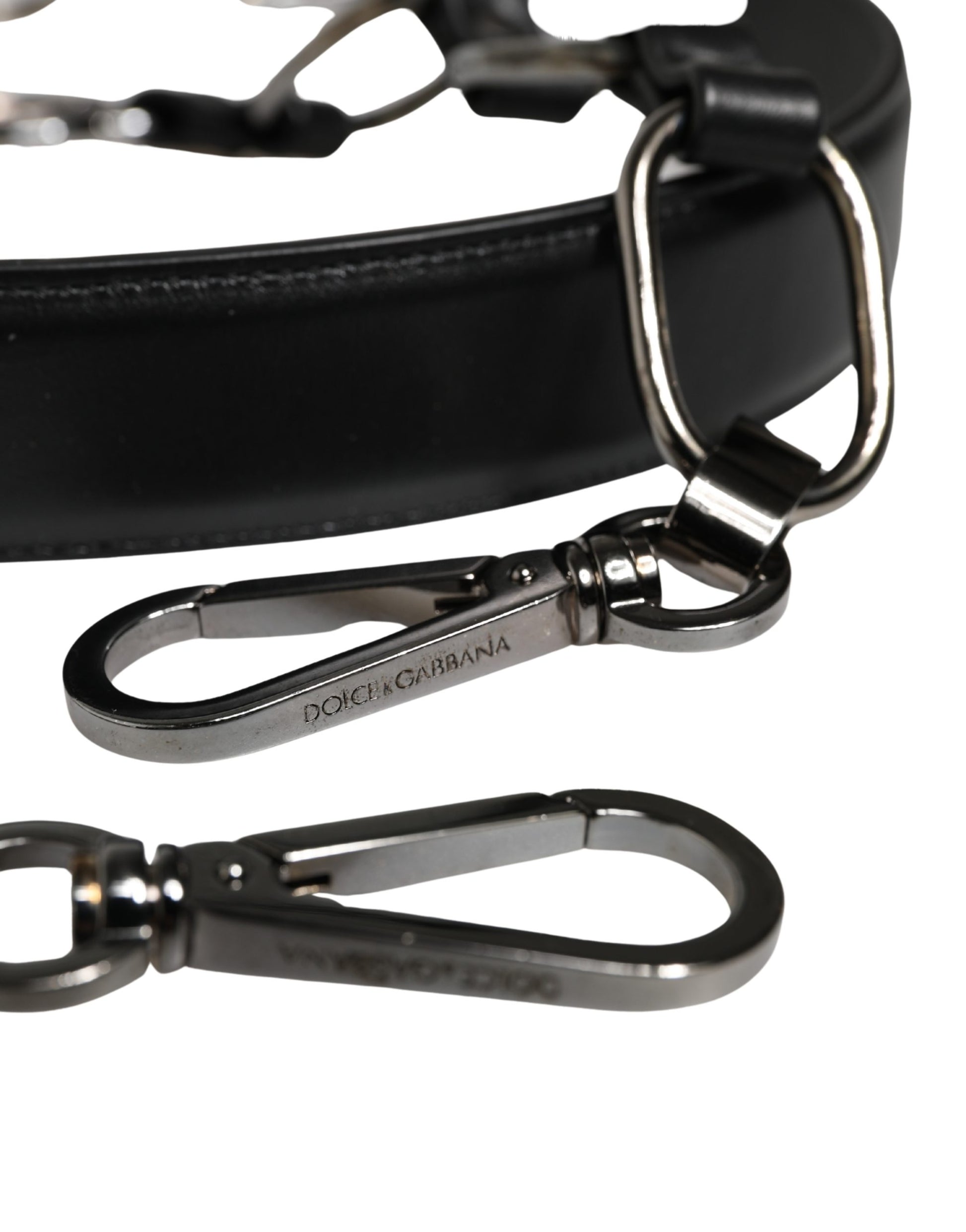 Shoulder Strap by Dolce & Gabbana for women in brass zamak & calf leather black & silver showcases a enviable design, perfect for elevating any ensemble as part of the Brass Zamak Calf Leather Shoulder Strap collection.