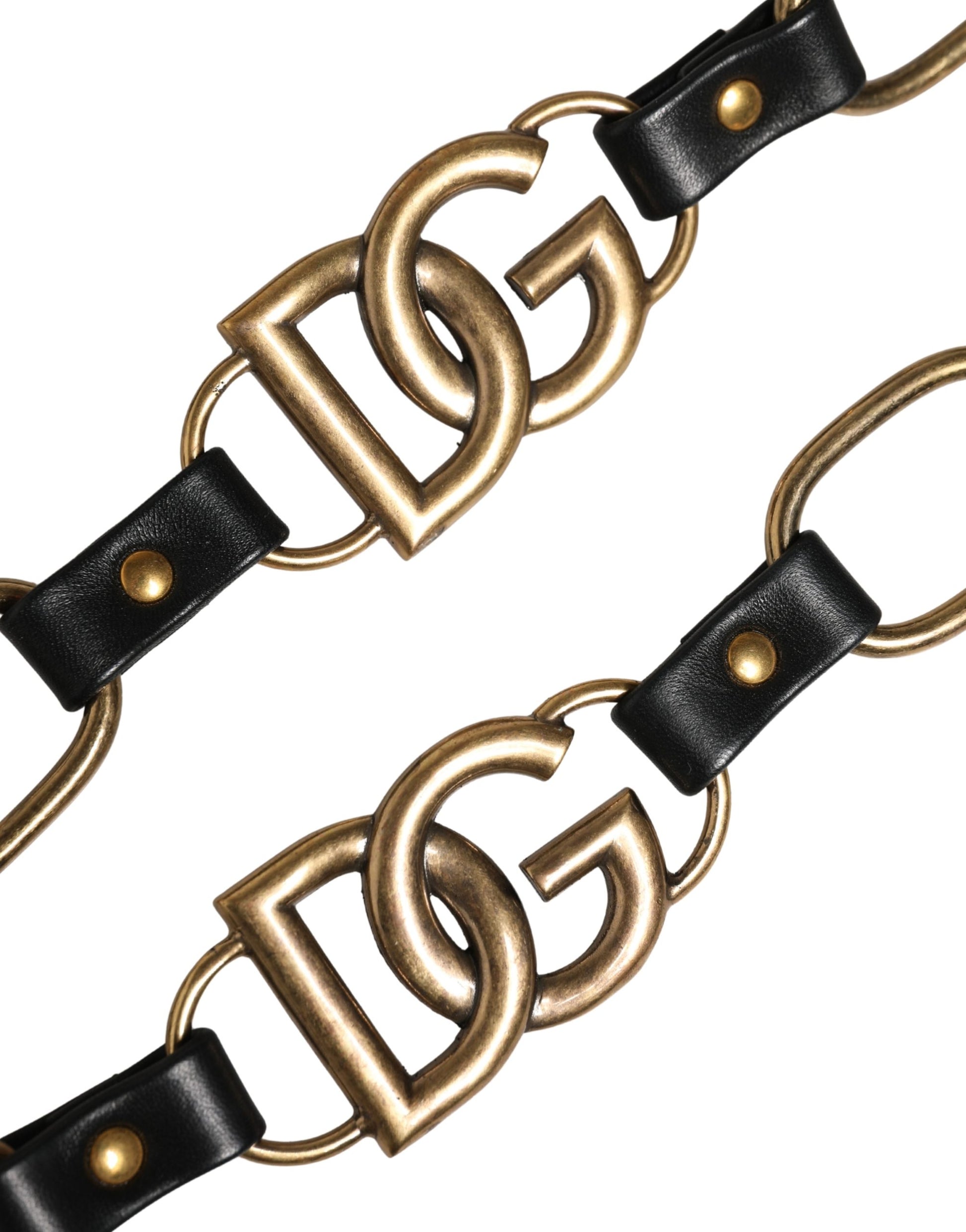 Shoulder Strap by Dolce & Gabbana for women in brass zamak & calf leather black & gold features a dynamic silhouette, artfully enhancing the dynamic design of this Brass Zamak Calf Leather Shoulder Strap.