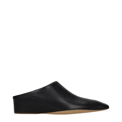 Clogs Slippers by Jil Sander for women in leather black features an timeless Women's Leather Clogs Slippers aesthetic, defined by a and a refined .