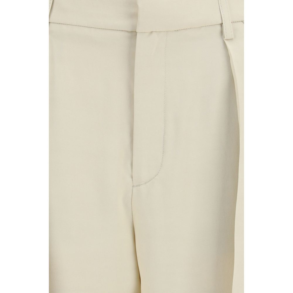 Trousers by Jacob Cohen for women in viscose silk beige presents a perennial silhouette, meticulously tailored with a regular-fit & wide cut, long finish, and an elegant mid rise.