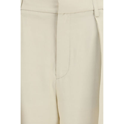 Trousers by Jacob Cohen for women in viscose silk beige presents a perennial silhouette, meticulously tailored with a regular-fit & wide cut, long finish, and an elegant mid rise.