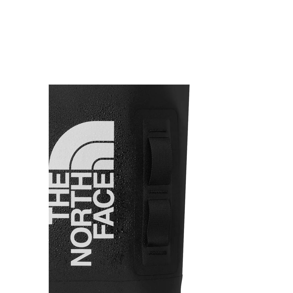 Handbag by The North Face for unisex in polyester black & white features a contemporary silhouette, showcasing a secure , ample , and contemporary for a sophisticated look.