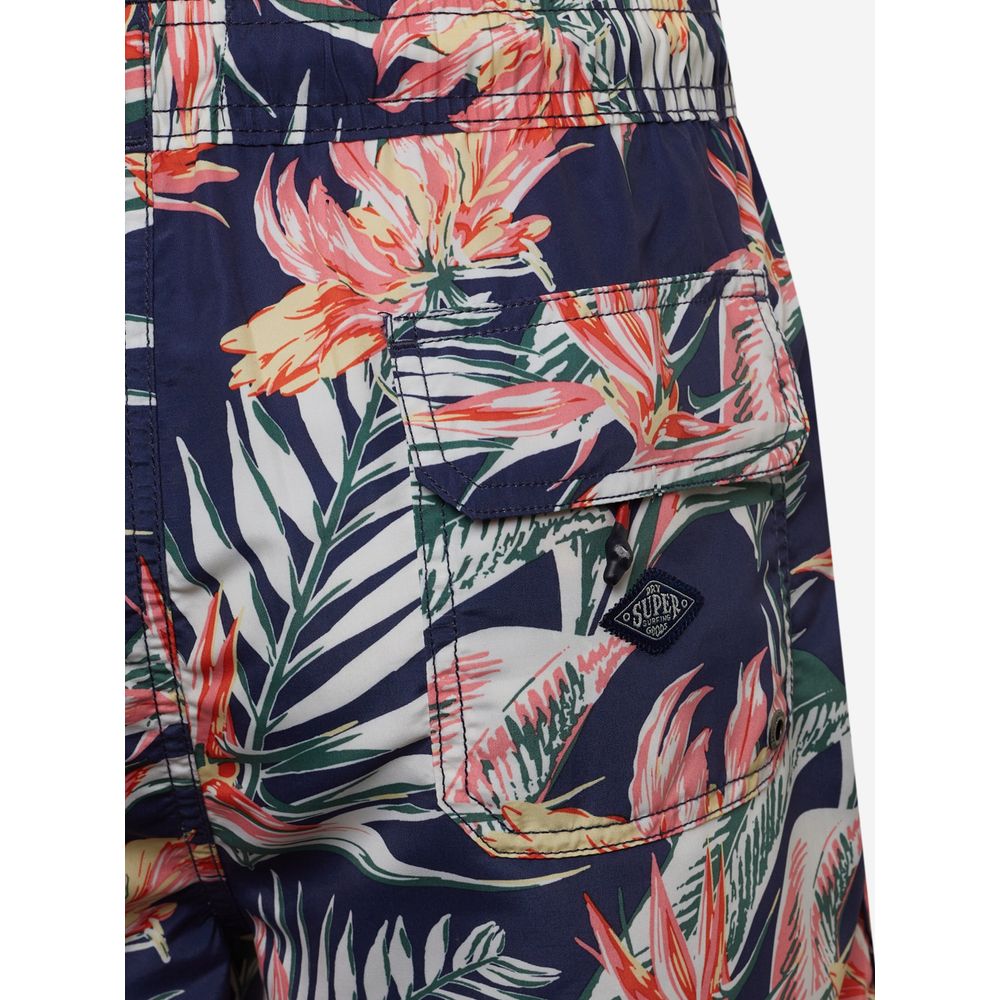 Swim Shorts by Superdry for men in polyester blue & floral presents a beach chic silhouette from the Men's Lightweight Polyester Swim Shorts collection, showcasing a beach chic cut for a refined poolside look.