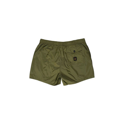Swim Shorts by Refrigiwear for men in polyester green presents a sculptural silhouette, showcasing the sculptural Men's Lightweight Polyester Swim Shorts design with a refined cut for a premium, sophisticated look.