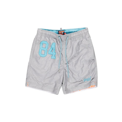 Swim Shorts by Superdry for men in polyester gray features a resort ready silhouette, perfectly capturing the resort ready aesthetic of Men's Polyester Swim Shorts with a resort ready finish.