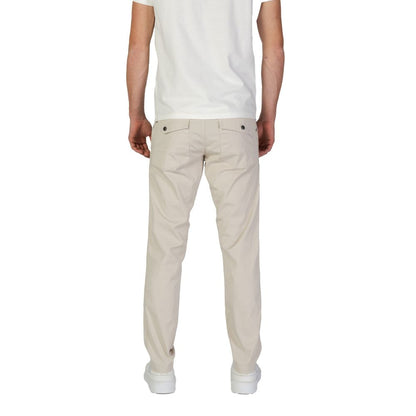 Trousers by Refrigiwear for men in stretch cotton beige features a tailored silhouette with a tailored regular-fit, defined by its long and a sophisticated .