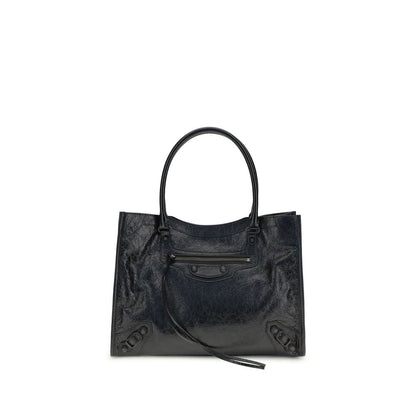Small 2-in-1 Shoulder & Crossbody Tote Bag by Balenciaga for women in leather black features a effortless chic silhouette with a secure zipper & magnetic, ample internal-pockets, and versatile crossbody-strap, shoulder-strap, adjustable-strap & handle for a effortless chic finish.
