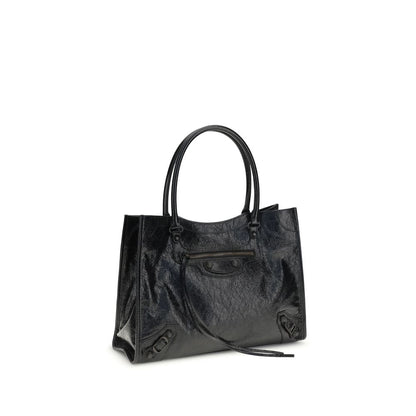 Small 2-in-1 Shoulder & Crossbody Tote Bag by Balenciaga for women in leather black features a enviable silhouette, showcasing a secure zipper & magnetic, ample internal-pockets, and enviable crossbody-strap, shoulder-strap, adjustable-strap & handle for a enviable finish.