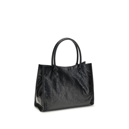 Small 2-in-1 Shoulder & Crossbody Tote Bag by Balenciaga for women in leather black features a effortless chic silhouette with a secure zipper & magnetic, ample internal-pockets, and versatile crossbody-strap, shoulder-strap, adjustable-strap & handle for a effortless chic finish.