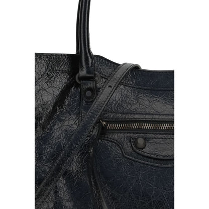 Small 2-in-1 Shoulder & Crossbody Tote Bag by Balenciaga for women in leather black showcases a enviable silhouette, artfully detailed with a secure zipper & magnetic, organized internal-pockets, and versatile crossbody-strap, shoulder-strap, adjustable-strap & handle for a enviable look.