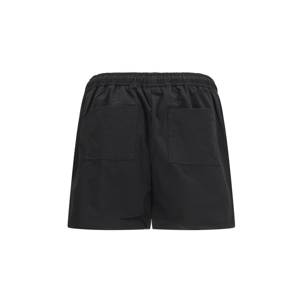 Swim Shorts from Represent for men in polyester black, white & print features an sleek silhouette, showcasing the distinct style of the Men's Polyester Swim Shorts collection.