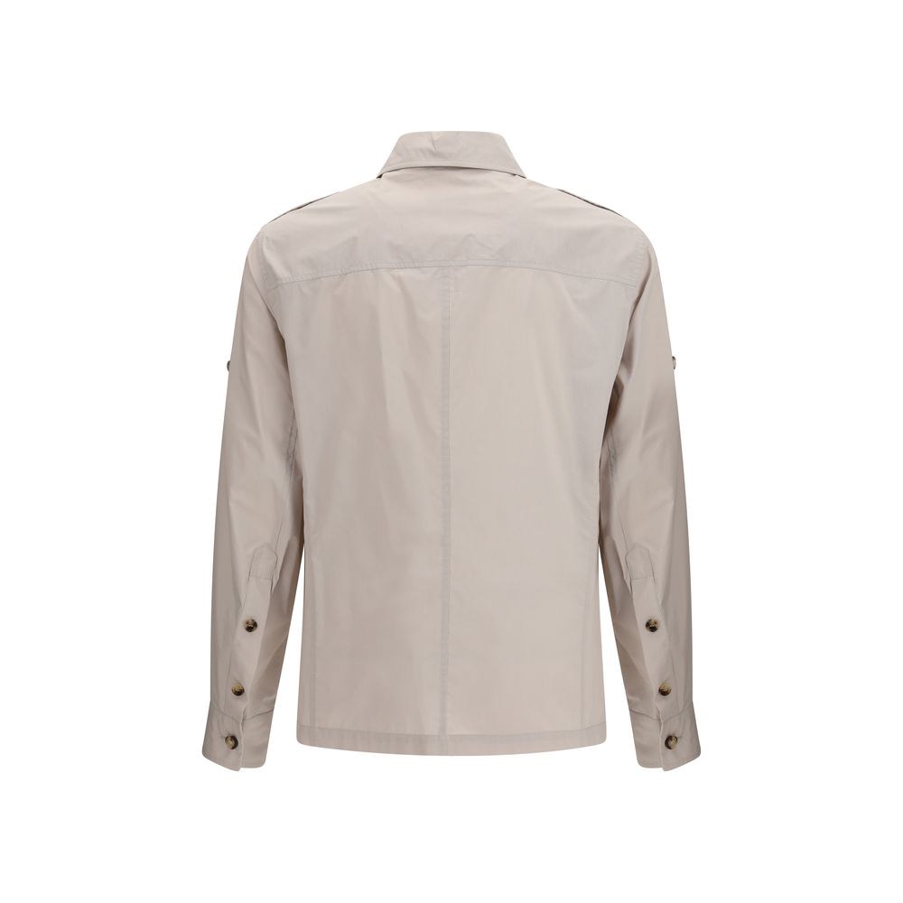 Overcoat by Brunello Cucinelli for men in polyamide cotton canvas beige features a contemporary silhouette showcasing a contemporary and refined water-resistant, lightweight & pockets for a sophisticated finish.