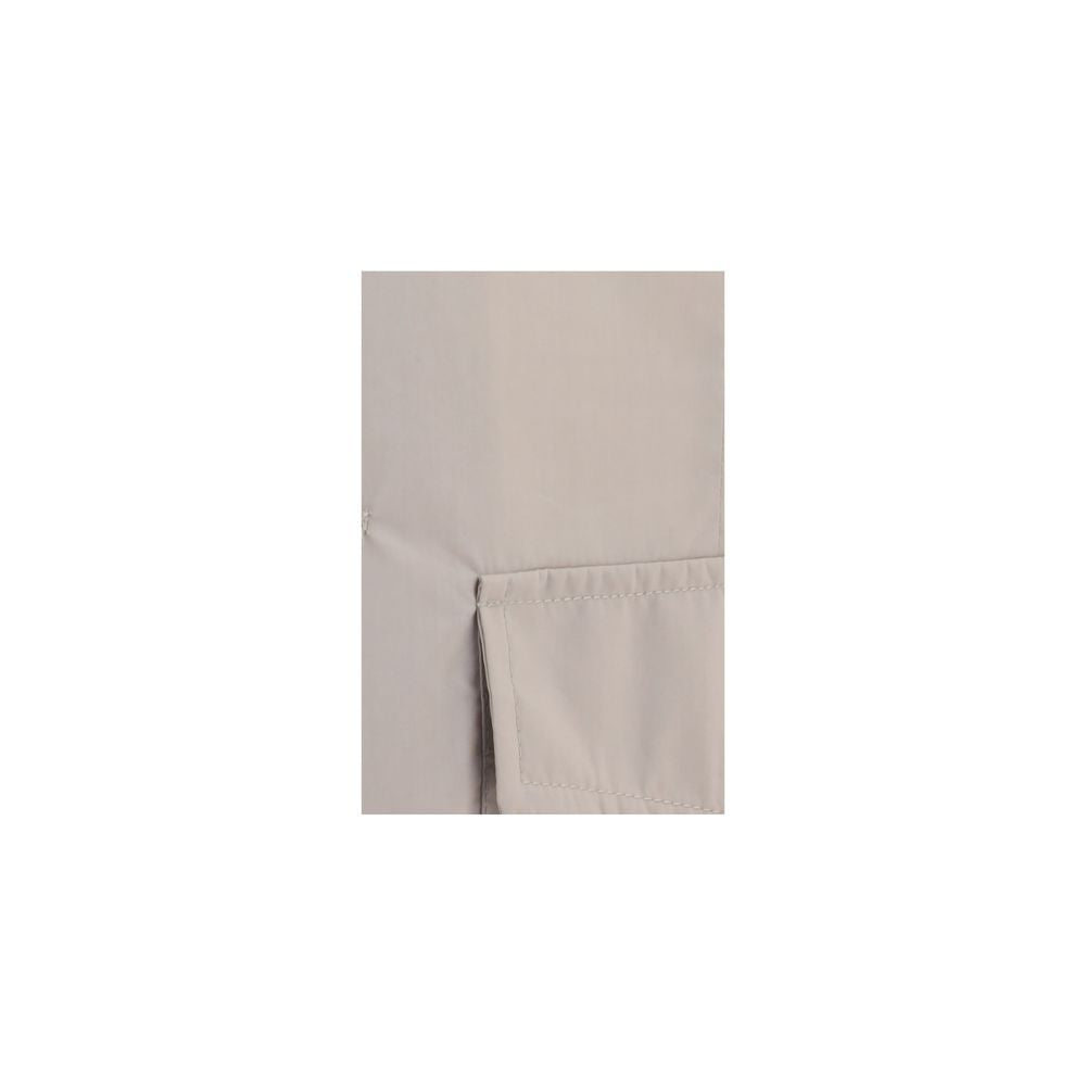 Overcoat by Brunello Cucinelli for men in polyamide cotton canvas beige features a contemporary silhouette showcasing a contemporary and refined water-resistant, lightweight & pockets for a sophisticated finish.