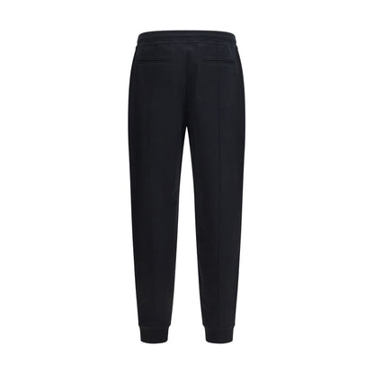 Joggers by Brunello Cucinelli for men in polyamide & cotton black presents a tailored silhouette, showcasing a tailored regular-fit and long cut with a refined for a truly tailored aesthetic.