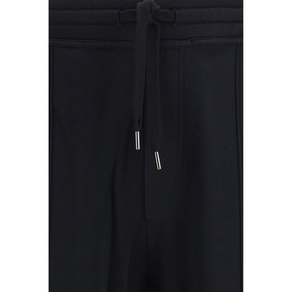 Joggers by Brunello Cucinelli for men in polyamide & cotton black features an sophisticated and regular-fit with a precise long, creating a sophisticated and sophisticated silhouette.