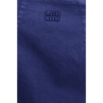 Dress by Miu Miu for women in cotton blue features an cute silhouette, detailed with a and that elegantly flows into a cute short.