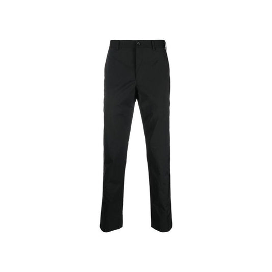 Casual Pants by Comme Des Garçons for men in polyurethane nylon & cupro black features an refined tailoring silhouette, showcasing a premium with a and long cut for a refined tailoring look.