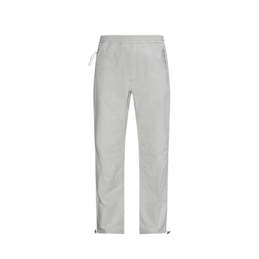 Activewear Pants by Moncler for men in polyester & viscose gray features an dynamic athletic with a long and , expertly finished with functional for a dynamic silhouette.
