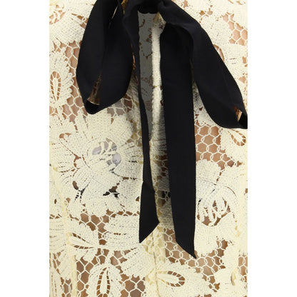 Dress by Self-Portrait for women in polyester bicolour & patterned features a dramatic silhouette, showcasing an elegant and that flows into a dramatic midi.