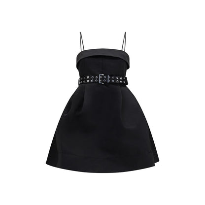 Dress by Ganni for women in polyester satin black presents a sinuous silhouette, showcasing a sophisticated and sleeveless detailed with a sinuous short for a refined finish.