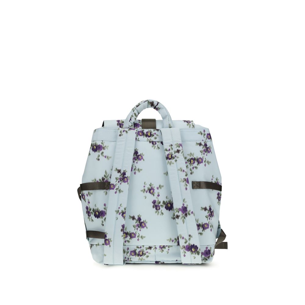 Backpack by Ganni for women in nylon & polyester blue, patterned, floral & print showcases an architectural Re Tech Nylon & Polyester Backpack design, featuring a secure buckle, ample external-pockets, and architectural handle, backpack-strap & adjustable-strap for a sophisticated look.