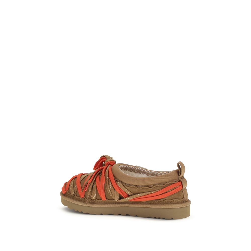 Sandals by UGG for men in acetate suede leather multicolor & signature features an statuesque Men's Acetate Suede Leather Sandals silhouette with a refined and elegant .