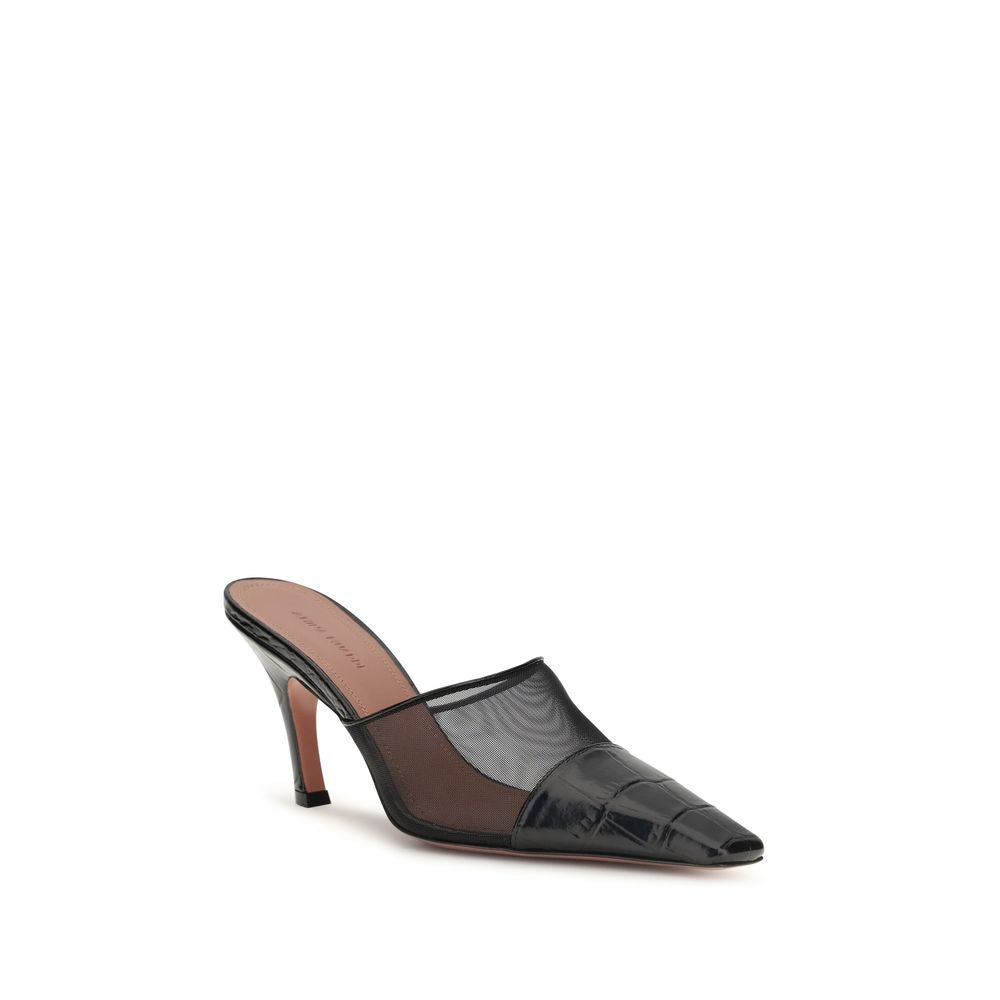 Mules Flat Shoes by Amina Muaddi for women in bos taurus calf leather black presents a effortless chic silhouette, showcasing the Jamie Women's Bos Taurus Calf Leather Mules Flat Shoes design with a effortless chic and for a sophisticated look.