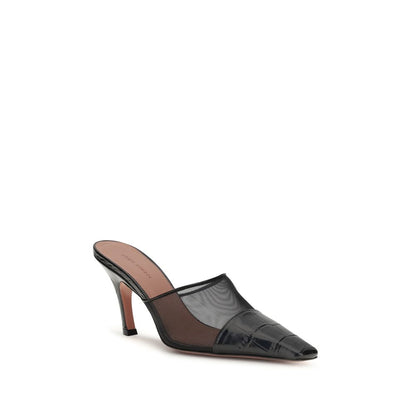 Mules Flat Shoes by Amina Muaddi for women in bos taurus calf leather black presents a effortless chic silhouette, showcasing the Jamie Women's Bos Taurus Calf Leather Mules Flat Shoes design with a effortless chic and for a sophisticated look.