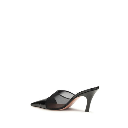 Mules Flat Shoes by Amina Muaddi for women in bos taurus calf leather black showcases a enchanting silhouette as part of the Jamie Women's Bos Taurus Calf Leather Mules Flat Shoes collection, defined by a enchanting and for a enchanting look.