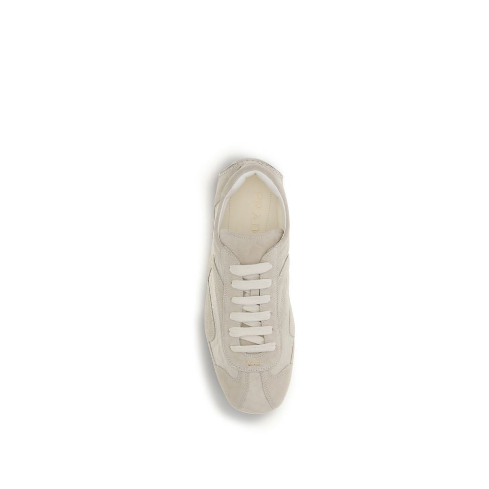 Sneakers by Prada for men in nylon polyamide & bos taurus suede calf leather beige & print presents a sumptuous silhouette, artfully capturing the essence of the Men's Fashion Nylon Polyamide & Bos Taurus Suede Calf Leather Sneakers with its sumptuous fashion style design.