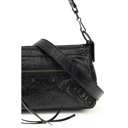 Mini Crossbody Shoulder Bag by Balenciaga for women in zamak cotton canvas calf & lambskin leather black features a effortless sophistication silhouette, secured by a zipper with ample and versatile crossbody-strap, handle & adjustable-strap for a effortless sophistication finish.
