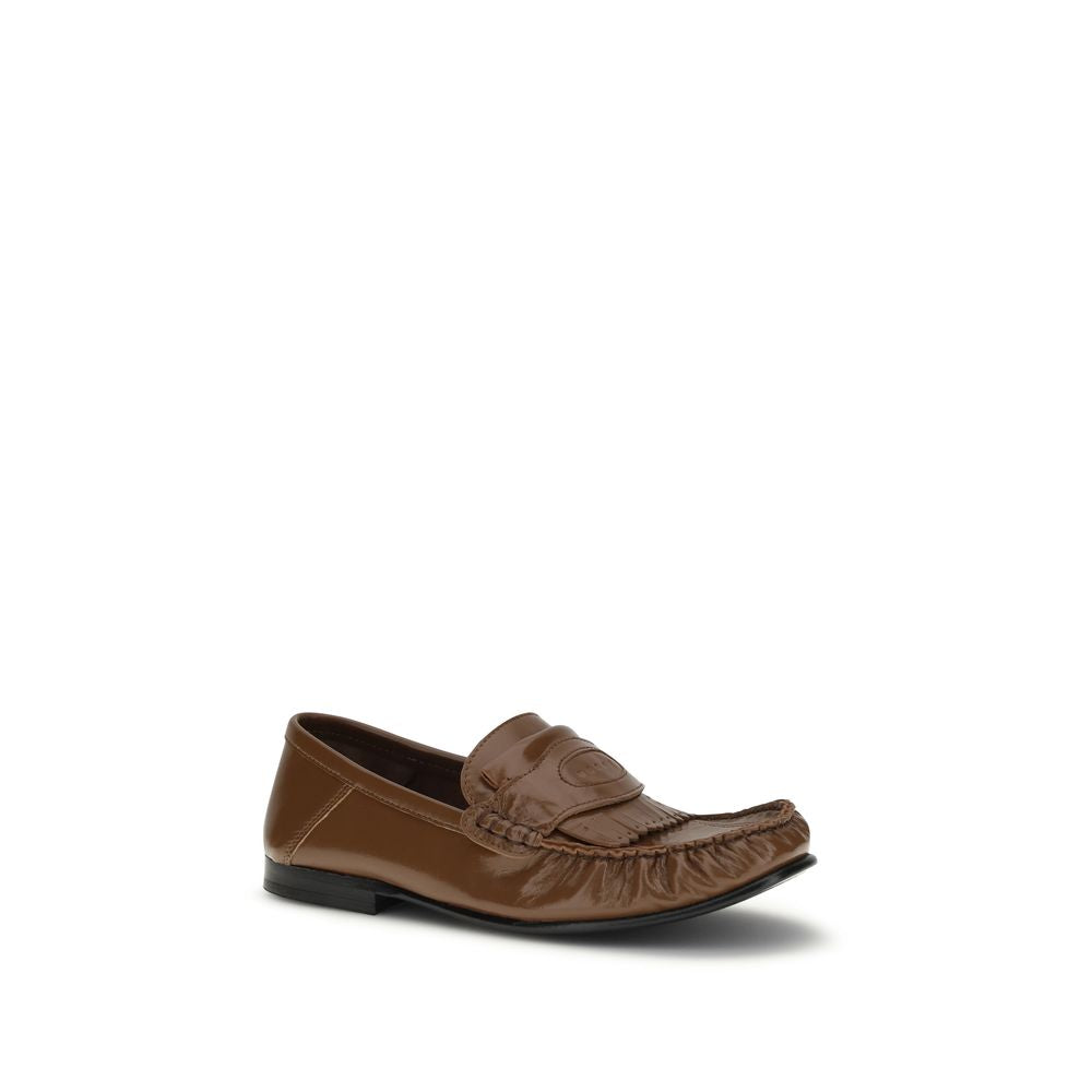 Flat Mule Mules Loafer Slip-On Shoes by Marni for women in leather brown showcases a impeccable silhouette as Women's Leather Flat Mule Mules Loafer Slip-On Shoes, artfully designed with a impeccable flat and refined for a impeccable finish.