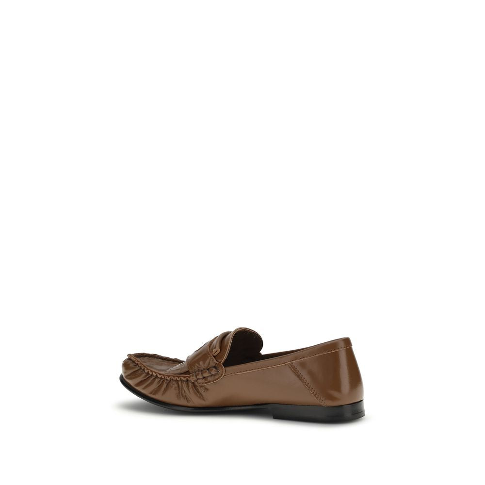 This Flat Mule Mules Loafer Slip-On Shoes by Marni for women in leather brown features an exquisite silhouette from the Women's Leather Flat Mule Mules Loafer Slip-On Shoes collection, defined by a sophisticated flat and elegant .