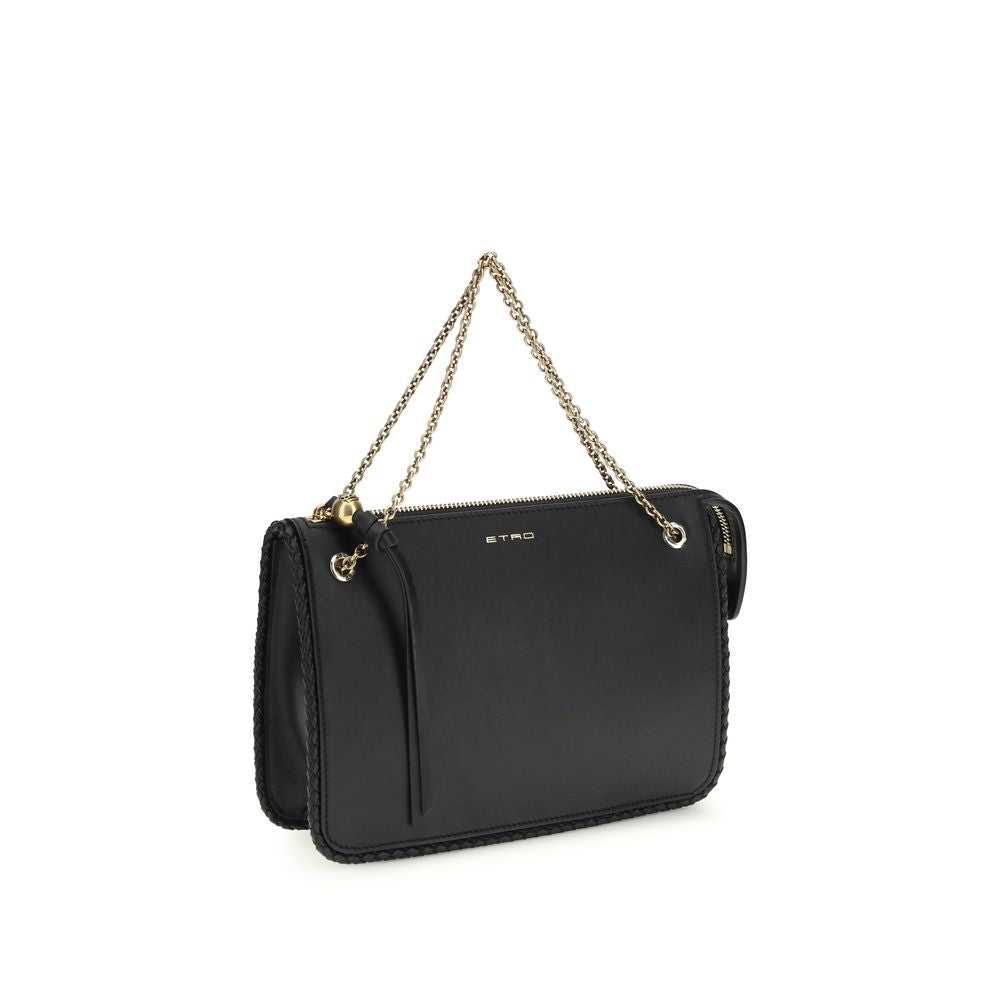 Compact Crossbody Evening Clutch Handbag by Etro for women in bos taurus grained calf leather black showcases a sculptural silhouette, featuring a secure zipper, ample , and versatile crossbody-strap & handle for a sculptural aesthetic.