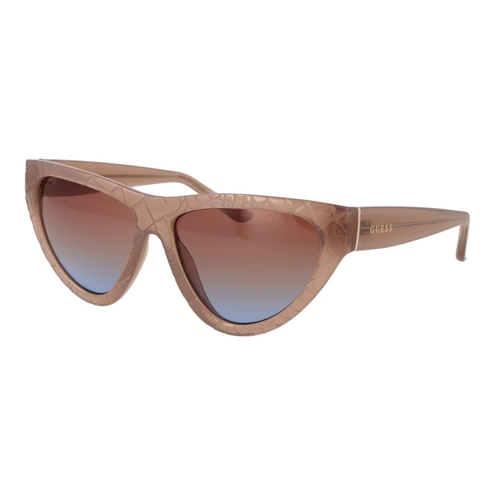 Sunglasses by Guess for women in plastic and beige presents a sumptuous silhouette, featuring beige coloured frame and full-rim cat-eye frame design with gradient category-2-medium-tint lens for a sumptuous look.