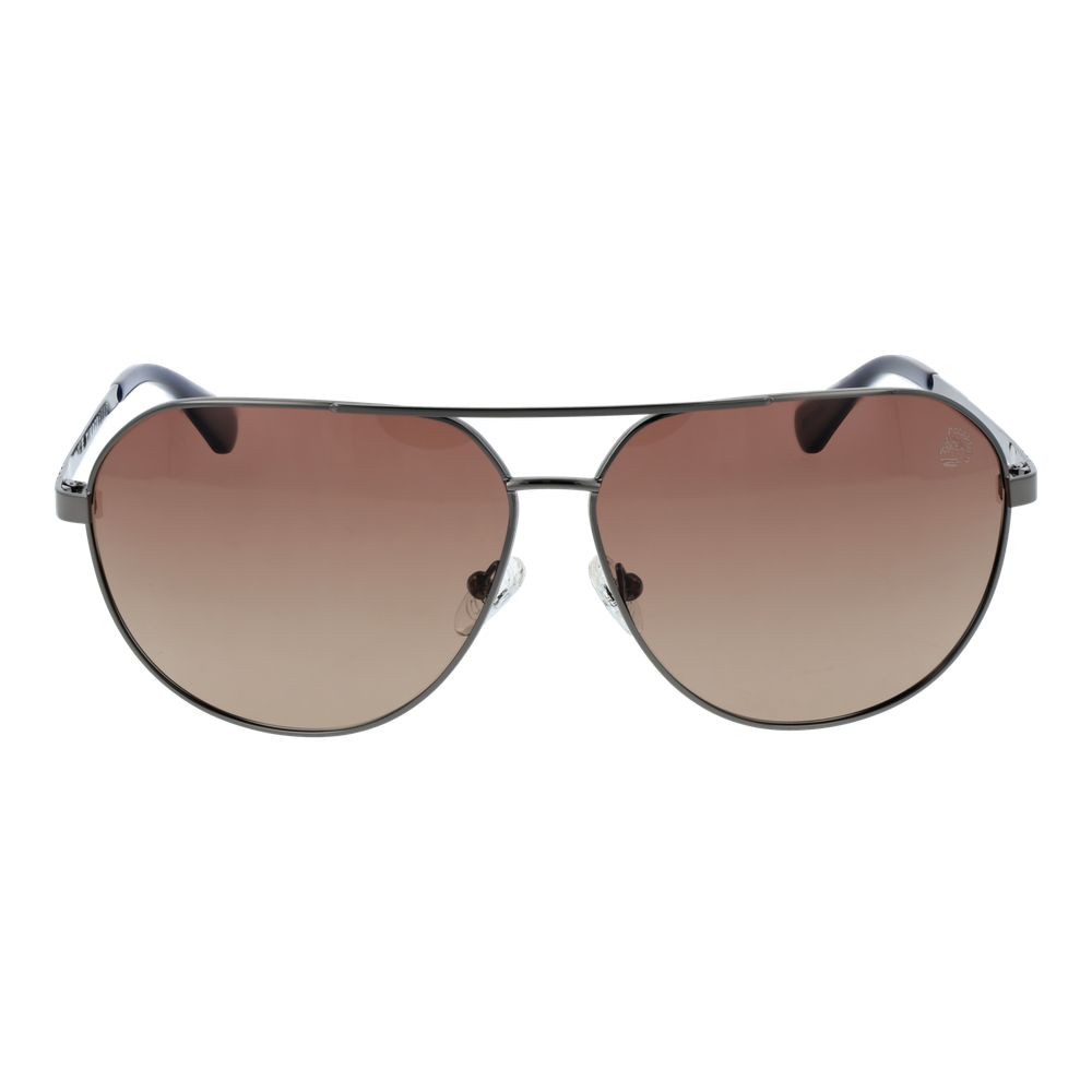 This Sunglasses by Timberland for men in metal gray presents a sumptuous silhouette, showcasing a sumptuous aviator full-rim frame design in gunmetal coloured frame and high-performance polarized gradient category-2-medium-tint lens.