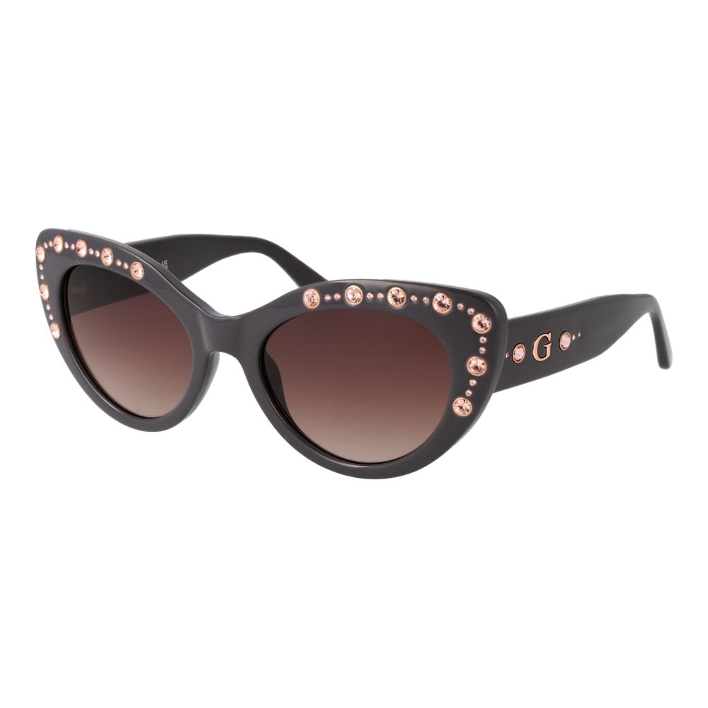 Sunglasses by Guess for women in gradient, brown & gray showcases a ethereal silhouette, featuring gray coloured frame cat-eye full-rim frame design with category-3-dark-tint gradient lens for a ethereal finish.