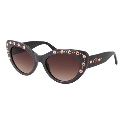Sunglasses by Guess for women in gradient, brown & gray showcases a ethereal silhouette, featuring gray coloured frame cat-eye full-rim frame design with category-3-dark-tint gradient lens for a ethereal finish.