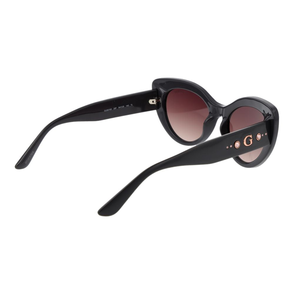 Sunglasses by Guess for women in gradient, brown & gray features an timeless cat-eye full-rim frame design with gray coloured frame frames and category-3-dark-tint gradient lens for a timeless finish.