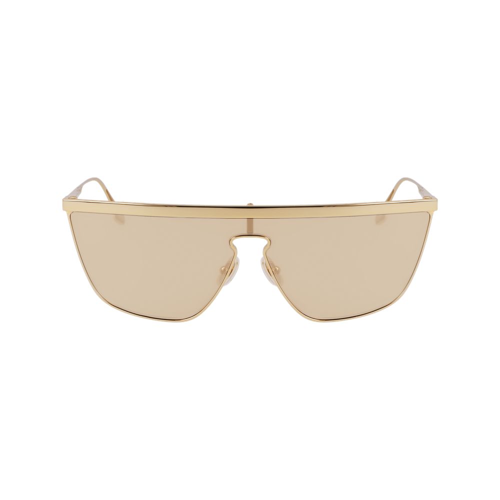 Sunglasses by Victoria Beckham for women in metal gold features a sumptuous silhouette, showcasing a sumptuous full-rim mono-lens frame design in gold coloured frame with high-performance mirrored category-2-medium-tint lens.