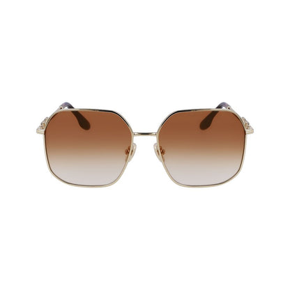 Sunglasses by Victoria Beckham for women in metal gold features a sumptuous silhouette, showcasing a sumptuous full-rim square frame design in gold coloured frame with high-performance gradient category-2-medium-tint lens.