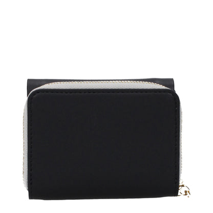 Wallet by Stella McCartney for women in leather black showcases a refined silhouette, artfully detailed with the signature style of the Leather Wallet and functional eco-friendly.