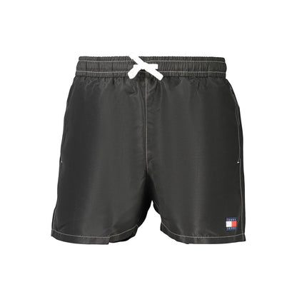 Swim Shorts by Tommy Hilfiger for men in polyester and black showcases a sinuous silhouette, expertly cut for a sinuous fit as part of the Men's Polyester Swim Shorts collection.