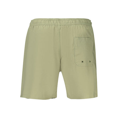 Swim Shorts by Calvin Klein for men in polyester green features an dramatic silhouette that defines the luxurious aesthetic and refined cut of the Men's Polyester Swim Shorts.