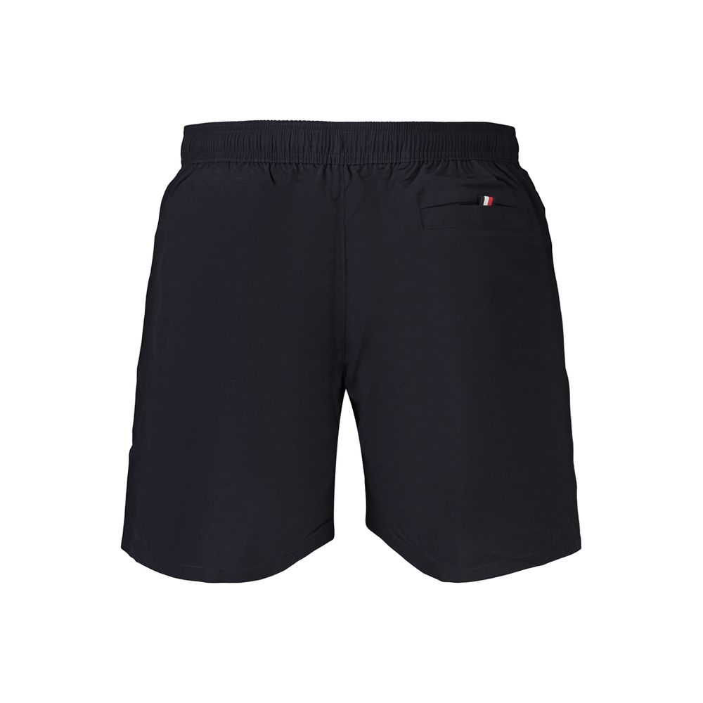 Swim Shorts by Tommy Hilfiger for men in polyester and blue showcases a sinuous silhouette, expertly cut for a sinuous fit as part of the Men's Polyester Swim Shorts collection.